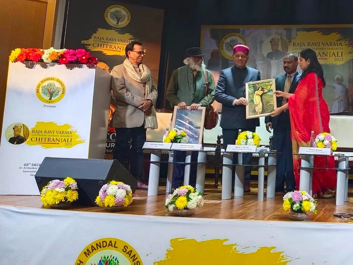 A Raja Ravi Varma print presented on stage at Chitranjali 2023