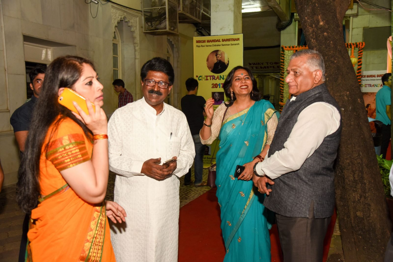 An official receiving a memento from the Chief Guest at Chitranjali